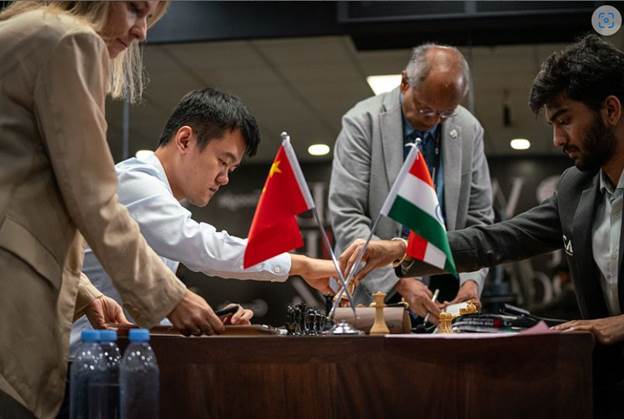 A group of people playing chess

Description automatically generated